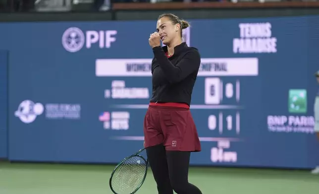 Aryna Sabalenka, of Belarus, celebrates after defeating Madison Keys, of the United States, during the semifinals at the BNP Paribas Open tennis tournament Friday, March 14, 2025, in Indian Wells, Calif. (AP Photo/Mark J. Terrill)