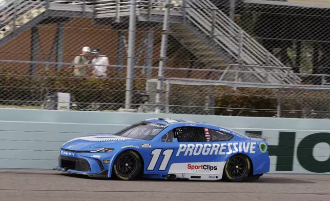 Denny Hamlin drives during a NASCAR Cup Series auto race at Homestead-Miami Speedway in Homestead, Fla., Sunday, March 23, 2025. (AP Photo/Terry Renna)