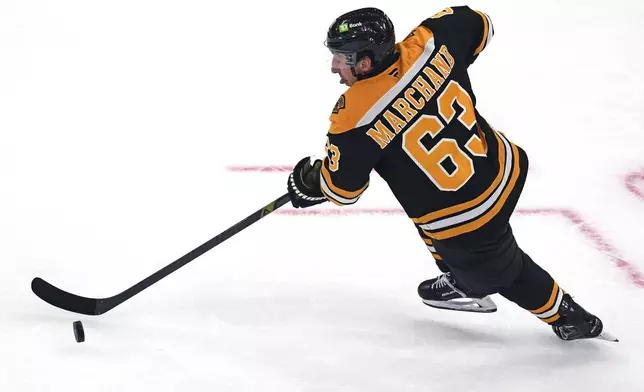 Boston Bruins left wing Brad Marchand skates against the Toronto Maple Leafs during the second period of an NHL hockey game, Tuesday, Feb. 25, 2025, in Boston. (AP Photo/Charles Krupa)