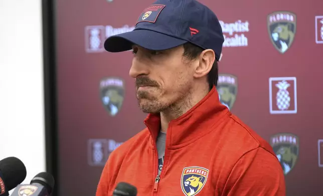Florida Panthers forward Brad Marchand, who was acquired in a trade by the Panthers from the Boston Bruins last Friday, speaks during a news conference Monday, March 10, 2025, in Fort Lauderdale, Fla. (AP Photo/Lynne Sladky)