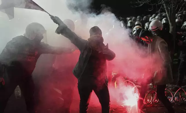 A protester shouts slogans during a protest against the arrest of Istanbul's Mayor Ekrem Imamoglu, in Istanbul, Turkey, Saturday, March 22, 2025. (AP Photo/Francisco Seco)