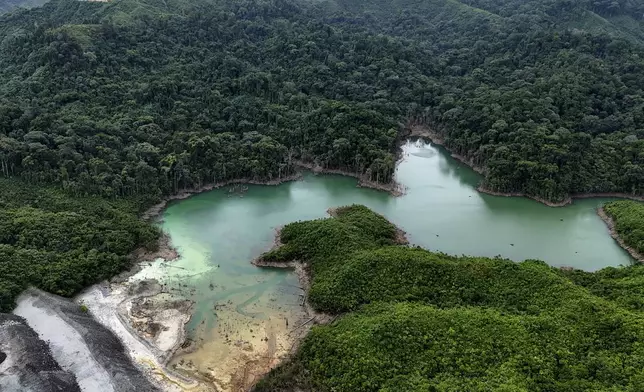 A tailing pond sits in the Cobre Panamá copper mine, owned by Canada's First Quantum Minerals, during a media tour of the mine that was closed after Panama's Supreme Court ruled that the government concession was unconstitutional, in Donoso, Panama, Friday, March 21, 2025. (AP Photo/Matias Delacroix)