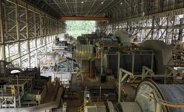 Mills at the Cobre Panamá copper mine, owned by Canada's First Quantum Minerals, sit idle during a press tour of the mine which was closed after Panama's Supreme Court ruled that the government concession was unconstitutional in Donoso, Panama, Friday, March 21, 2025. (AP Photo/Matias Delacroix)