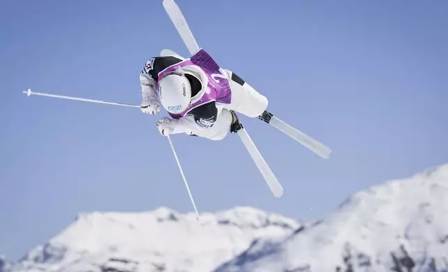 Japan's Ikuma Horishima competes in the men's moguls at the Freestyle World Championships in St. Moritz, Switzerland, Wednesday, March 19, 2025. (Gian Ehrenzeller/Keystone via AP)
