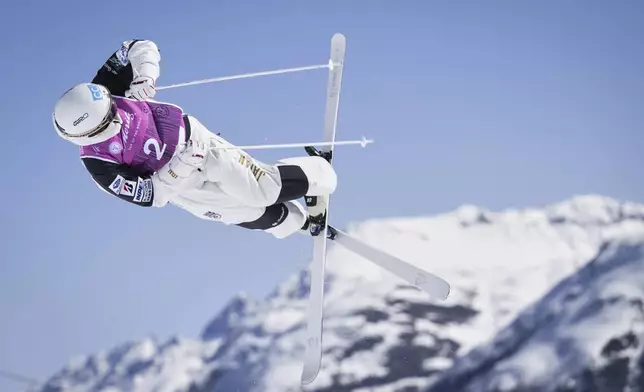 Japan's Ikuma Horishima competes in the men's moguls at the Freestyle World Championships in St. Moritz, Switzerland, Wednesday, March 19, 2025. (Gian Ehrenzeller/Keystone via AP)