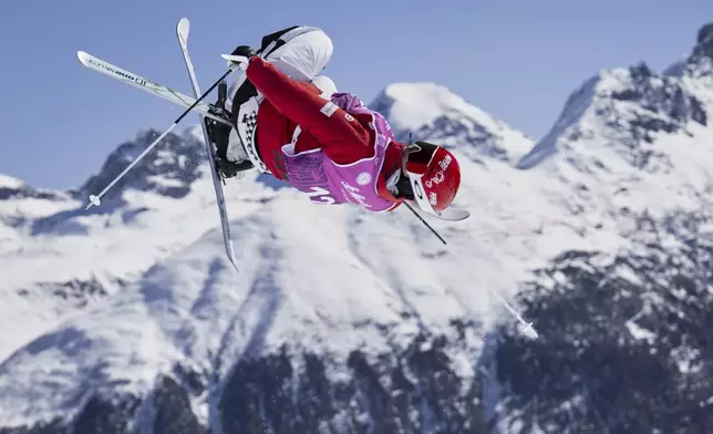 South Korea's Daeyoon Jung competes in the men's moguls at the Freestyle World Championships in St. Moritz, Switzerland, Wednesday, March 19, 2025. (Gian Ehrenzeller/Keystone via AP)
