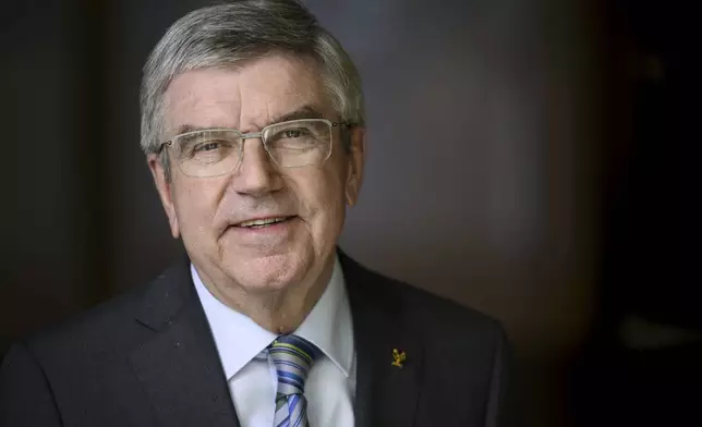 International Olympic Committee (IOC) President Thomas Bach poses for the photographer prior to an interview with the Associated Press at the Olympic House, in Lausanne, Switzerland, Wednesday, March 5, 2025. (Laurent Gillieron/Keystone via AP)