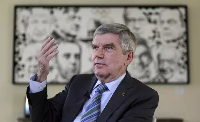 International Olympic Committee (IOC) President Thomas Bach talks to the Associated Press during an interview at the Olympic House, in Lausanne, Switzerland, Wednesday, March 5, 2025. (Laurent Gillieron/Keystone via AP)