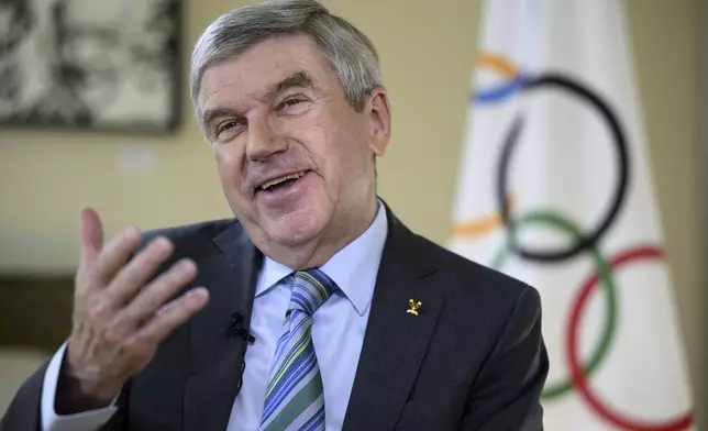 International Olympic Committee (IOC) President Thomas Bach talks to the Associated Press during an interview at the Olympic House, in Lausanne, Switzerland, Wednesday, March 5, 2025. (Laurent Gillieron/Keystone via AP)