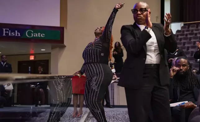 Fans and friends gather to celebrate the life of singer and actress Angie Stone, Friday, March 14, 2025, in Austell. Ga. (AP Photo/Olivia Bowdoin)