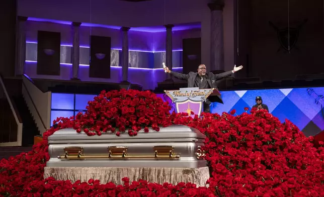 Fans and friends gather to celebrate the life of singer and actress Angie Stone, Friday, March 14, 2025, in Austell. Ga. (AP Photo/Olivia Bowdoin)