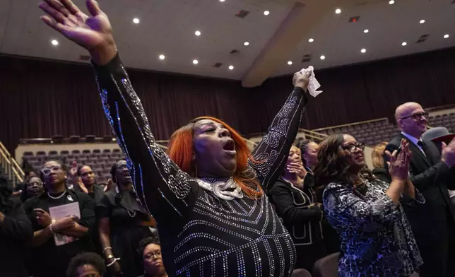 Fans and friends gather to celebrate the life of singer and actress Angie Stone, Friday, March 14, 2025, in Austell. Ga. (AP Photo/Olivia Bowdoin)