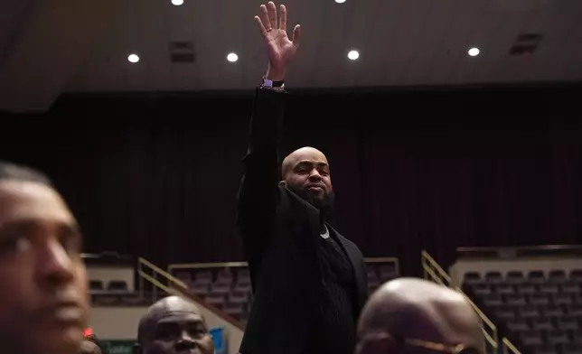 Fans and friends gather to celebrate the life of singer and actress Angie Stone, Friday, March 14, 2025, in Austell. Ga. (AP Photo/Olivia Bowdoin)