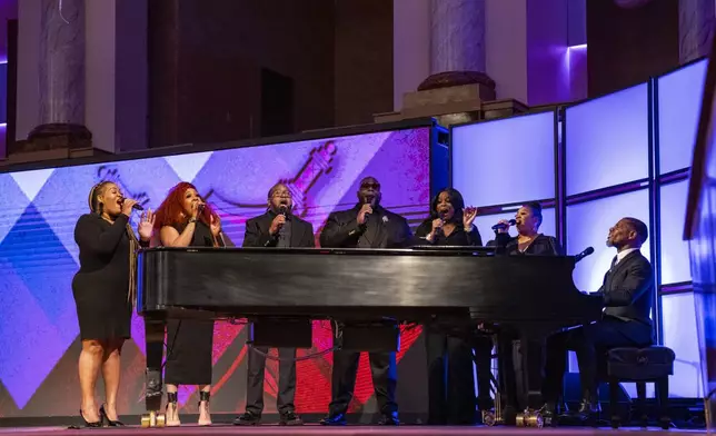 Renowned Gospel Music singer, Kirk Franklin, performs at the memorial service for singer and actress Angie Stone, Friday, March 14, 2025, in Austell. Ga. (AP Photo/Olivia Bowdoin)