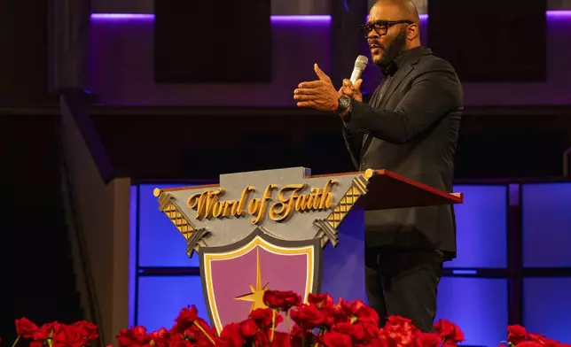 Tyler Perry speaks at the memorial service for singer and actress Angie Stone, Friday, March 14, 2025, in Austell. Ga. (AP Photo/Olivia Bowdoin)