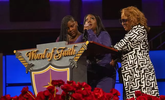 The family of singer and actress Angie Stone speak at her memorial service, Friday, March 14, 2025, in Austell. Ga. (AP Photo/Olivia Bowdoin)