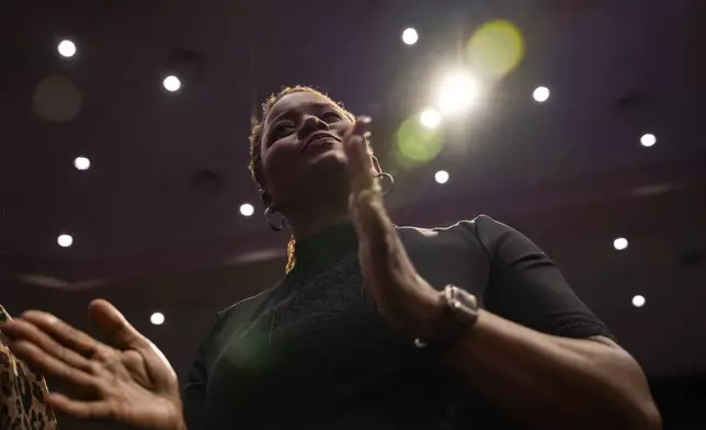 Fans and friends gather to celebrate the life of singer and actress Angie Stone, Friday, March 14, 2025, in Austell. Ga. (AP Photo/Olivia Bowdoin)