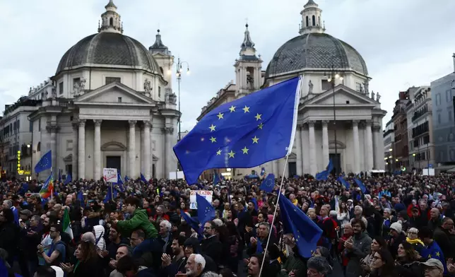 People protest during a pro-Europe rally in Rome’s central Piazza del Popolo, Italy, Saturday, March 15, 2025. (Cecilia Fabiano/LaPresse via AP)