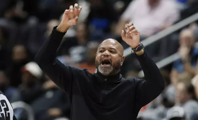 Detroit Pistons head coach J.B. Bickerstaff shouts to his team during the first half of an NBA basketball game against the Washington Wizards, Tuesday, March 11, 2025, in Detroit. (AP Photo/Duane Burleson)