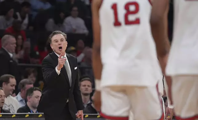 St. John's head coach Rick Pitino calls out to his team during the first half of an NCAA college basketball game against the Marquette in the semifinals of the Big East tournament Friday, March 14, 2025, in New York. (AP Photo/Frank Franklin II)