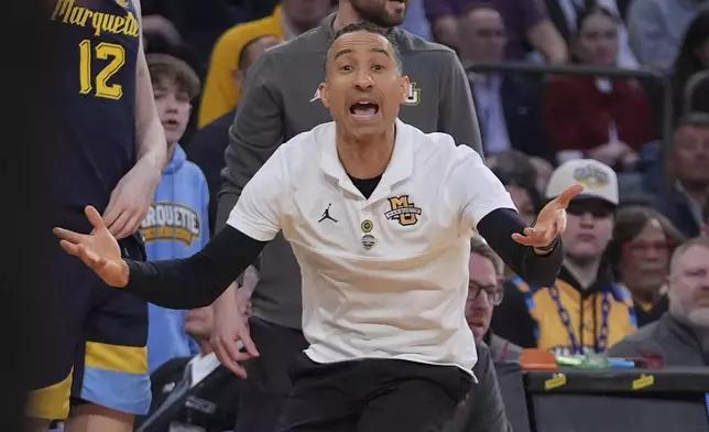 Marquette head coach Shaka Smart argues for a call during the first half of an NCAA college basketball game against the St. John's in the semifinals of the Big East tournament Friday, March 14, 2025, in New York. (AP Photo/Frank Franklin II)