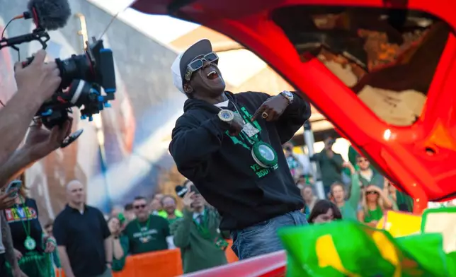 Flavor Flav attends the at the 22nd Annual World's Shortest St. Patrick's Day Parade on Monday, March 17, 2025, in Hot Springs, Ark. (AP Photo/Katie Adkins)