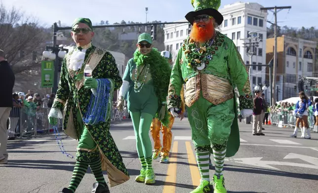 Attendees gather at the 22nd Annual World's Shortest St. Patrick's Day Parade on Monday, March 17, 2025, in Hot Springs, Ark. (AP Photo/Katie Adkins)