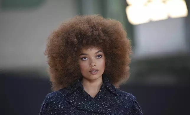 Whitney Peak arrives for the the Chanel Fall/Winter 2025-2026 Womenswear collection presented Tuesday, March 11, 2025. in Paris. (AP Photo/Christophe Ena).