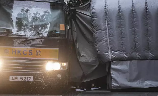 A Correctional Services prison van arrives at the Court of Final Appeal in Hong Kong, Thursday, March 6, 2025. Three former organizers of Hong Kong's annual vigil in remembrance of the 1989 Tiananmen Square crackdown won their bid at the top court on Thursday to overturn their conviction over their refusal to provide information to police, marking a rare victory for the city's pro-democracy activists. (AP Photo/Chan Long Hei)