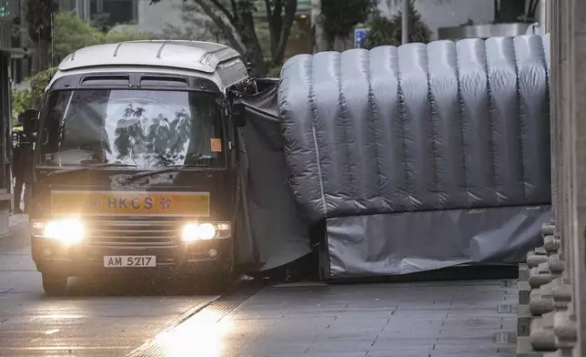 A Correctional Services prison van arrives at the Court of Final Appeal in Hong Kong, Thursday, March 6, 2025. Three former organizers of Hong Kong's annual vigil in remembrance of the 1989 Tiananmen Square crackdown won their bid at the top court on Thursday to overturn their conviction over their refusal to provide information to police, marking a rare victory for the city's pro-democracy activists. (AP Photo/Chan Long Hei)