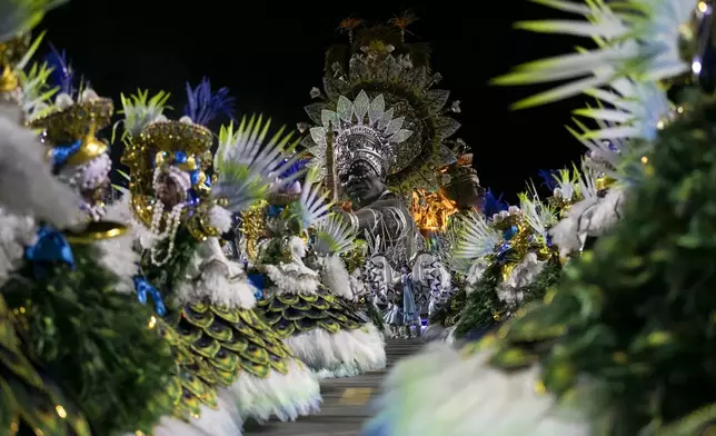 Performers from the Unidos da Tijuca samba school dance during Carnival celebrations at the Sambadrome in Rio de Janeiro, Monday, March 3, 2025. (AP Photo/Bruna Prado)