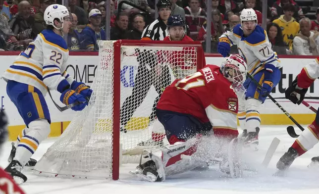 Florida Panthers goaltender Vitek Vanecek (41) defends the goal during the first period of an NHL hockey game against the Buffalo Sabres, Saturday, March 8, 2025, in Sunrise, Fla. (AP Photo/Lynne Sladky)