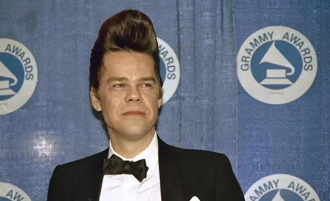 FILE - Buster Poindexter is seen at the Grammy Awards in New York's Radio City Music Hall, March 2, 1988. (AP Photo, File)