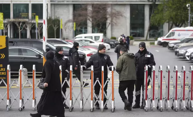 Security agents cordon off the area around City Hall following the arrest of Istanbul mayor Ekrem Imamoglu, in Istanbul, Turkey, Wednesday, March 19, 2025.(AP Photo/Francisco Seco)