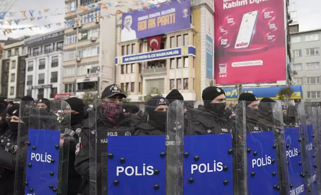 Police cordon off the roads leading to the Vatan Security Department, where Istanbul Mayor Ekrem Imamoglu is expected to be taken following his arrest in Istanbul, Turkey, Wednesday, March 19, 2025. (AP Photo/Francisco Seco)