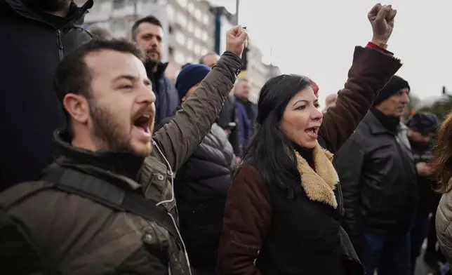 People chant slogans as they protest the arrest of Istanbul Mayor Ekrem Imamoglu in Istanbul, Turkey, Wednesday, March 19, 2025. (AP Photo/Emrah Gurel)