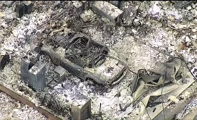 This image provided by shows aerials over the damage caused by the wildfires in Logan County, Okla. (KOCO via AP)