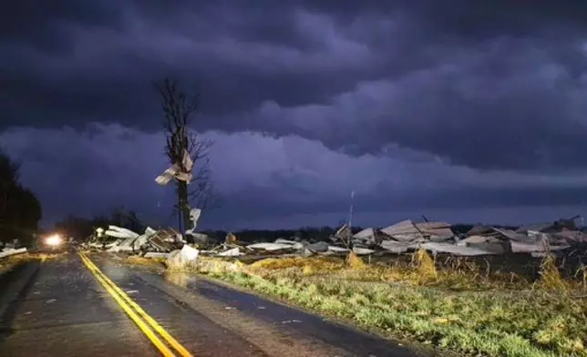 Debris covers the road during a severe storm passed the area north of Seymour, Mo., in Webster County late Friday, March 14, 2025. (Trooper Austin James/Missouri State Highway Patrol via AP)