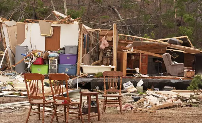 A home is destroyed after a severe storm, Saturday, March 15, 2025, in Wayne County, Mo. (AP Photo/Jeff Roberson)