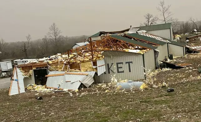 In this photo provided by Missouri State Highway Patrol, a home is damaged after a severe storm passed the area near Ozark County, Mo., early Saturday, March 15, 2025. (Missouri State Highway Patrol via AP)