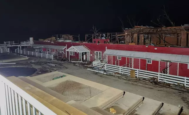In this photo provided by Missouri State Highway Patrol, a building is damaged after a severe storm passed the area near Ozark County, Mo., late Friday, March 14, 2025. (Missouri State Highway Patrol via AP)