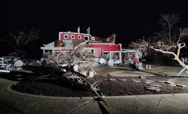 In this photo provided by Missouri State Highway Patrol, a home is damaged after a severe storm passed the area near Ozark County, Mo., late Friday, March 14, 2025. (Missouri State Highway Patrol via AP)