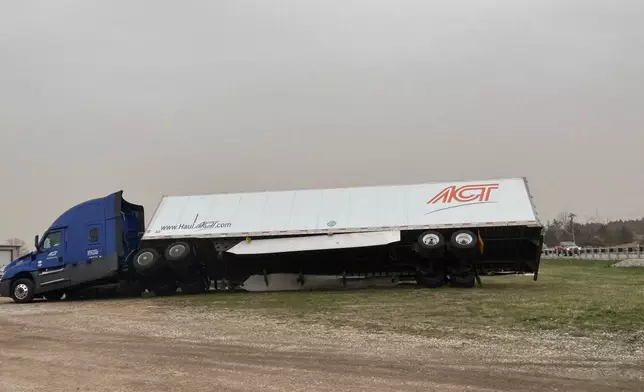 In this photo provided by Missouri State Highway Patrol, a truck is damaged after a severe storm passed the area near Ozark County, Mo., early Saturday, March 15, 2025. (Missouri State Highway Patrol via AP)