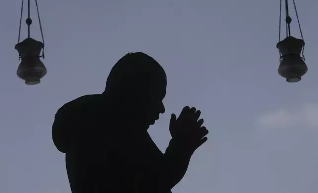 A Muslim worshipper prays during the holy fasting month of Ramadan, at Amr ibn al-Aas Mosque in Cairo, Egypt, Friday, March 7, 2025. (AP Photo/Amr Nabil)