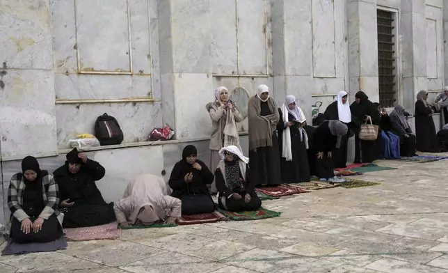 Women pray at the Al-Aqsa Mosque compound for the first Friday Prayers of the Muslim holy month of Ramadan in the Old City of Jerusalem, Friday, March 7, 2025. (AP Photo/Mahmoud Illean)
