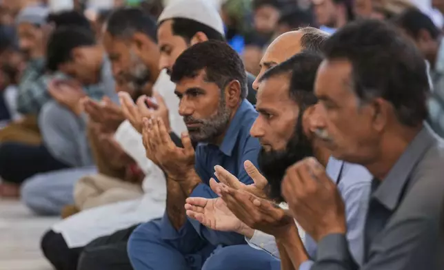 Muslims attend first Friday prayers during the Muslim holy fasting month of Ramadan, at a mosque in Karachi, Pakistan Friday, March 7, 2025. (AP Photo/Fareed Khan)