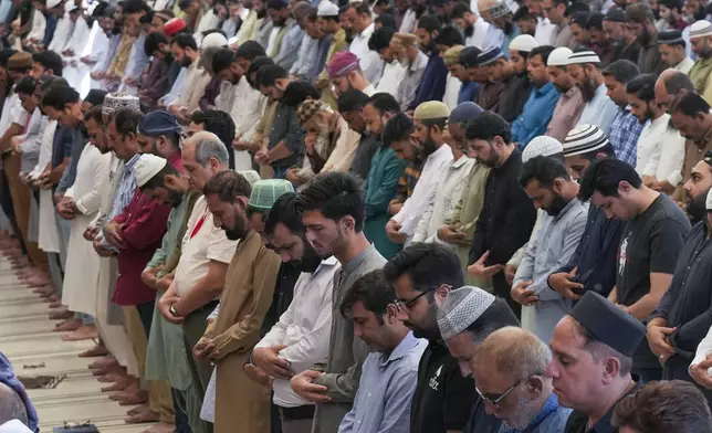 Muslims attend first Friday prayers during the Muslim holy fasting month of Ramadan, at a mosque in Karachi, Pakistan Friday, March 7, 2025. (AP Photo/Fareed Khan)