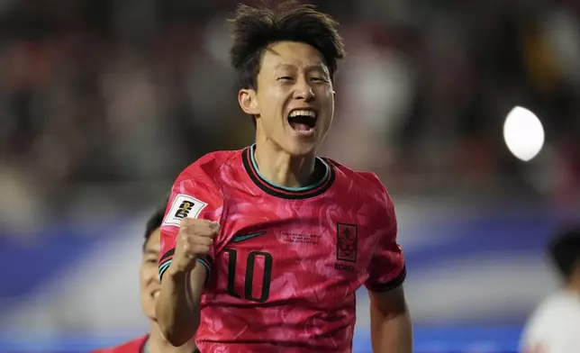 South Korea's Lee Jae-sung celebrates after scoring his side's opening goal during the third round of the Asian qualifier group B match between South Korea and Jordan for 2026 World Cup at Suwon World Cup Stadium in Suwon, South Korea, Tuesday, March 25, 2025. (AP Photo/Lee Jin-man)