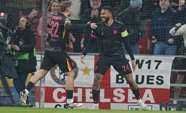 Chelsea's Reese James, right, celebrates scoring during the Conference League round of 16 soccer match between FC Copenhagen and Chelsea FC at Parken Stadium in Copenhagen, Denmark, Thursday March 6, 2025. (Liselotte Sabroe/Ritzau Scanpix via AP)