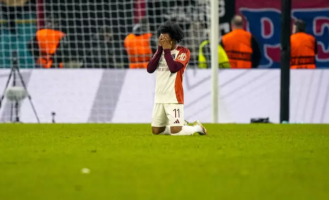 Lyon's Malick Fofana prays at the end of the Europa League round of 16, first leg soccer match between FCSB and Lyon at the National Arena stadium, Thursday, March 6, 2025. (AP Photo/Andreea Alexandru)